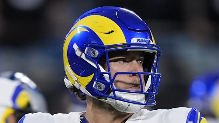 Jan 10, 2026; Charlotte, NC, USA; Los Angeles Rams quarterback Matthew Stafford (9) drops back to pass against the Carolina Panthers in the first half during the NFC Wild Card Round game at Bank of America Stadium. Mandatory Credit: Jim Dedmon-Imagn Images
