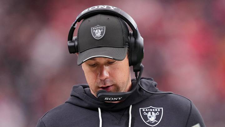 Oct 4, 2026; Paradise, Nevada, USA;  Las Vegas Raiders head coach Klint Kubiak looks at his play sheet against the Kansas City Chiefs during the third quarter at Allegiant Stadium.  Mandatory Credit: Joe Camporeale-Imagn Images