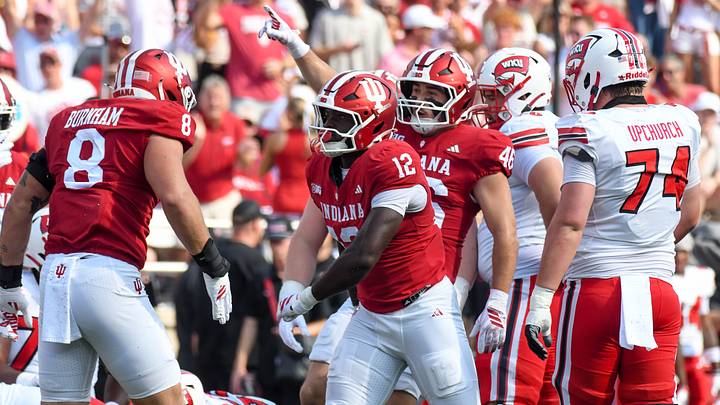Sep 19, 2026; Bloomington, Indiana, USA; Indiana Hoosiers defensive lineman Tobi Osunsanmi (12) celebrates after a sack against the Western Kentucky Hilltoppers during the first half at Merchants Bank Field at Memorial Stadium. Mandatory Credit: Robert Goddin-Imagn Images Sep 19, 2026; Bloomington, Indiana, USA; Indiana Hoosiers defensive lineman Tobi Osunsanmi (12) celebrates after a sack against the Western Kentucky Hilltoppers during the first half at Merchants Bank Field at Memorial Stadium. Mandatory Credit: Robert Goddin-Imagn Images