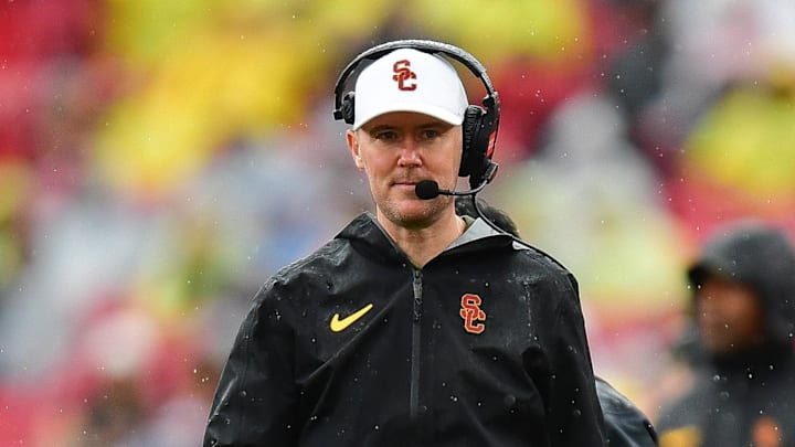 Nov 15, 2025; Los Angeles, California, USA; Southern California Trojans head coach Lincoln Riley watches game action against the Iowa Hawkeyes during the first half at the Los Angeles Memorial Coliseum. Mandatory Credit: Gary A. Vasquez-Imagn Images Nov 15, 2025; Los Angeles, California, USA; Southern California Trojans head coach Lincoln Riley watches game action against the Iowa Hawkeyes during the first half at the Los Angeles Memorial Coliseum. Mandatory Credit: Gary A. Vasquez-Imagn Images