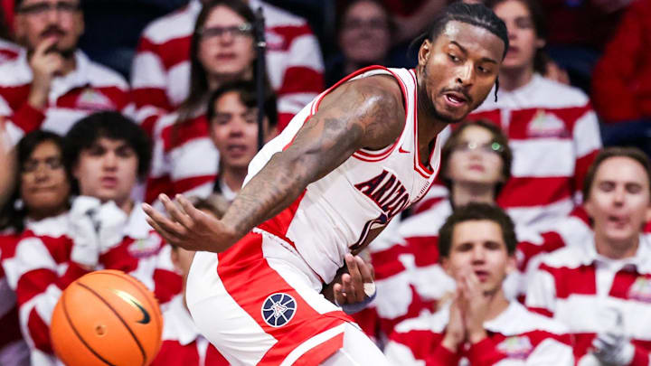 Dec 16, 2025; Tucson, Arizona, USA; Arizona Wildcats guard Jaden Bradley (0) passes the ball during the second half of the game against the Abilene Christian Wildcats at McKale Memorial Center. Mandatory Credit: Aryanna Frank-Imagn Images