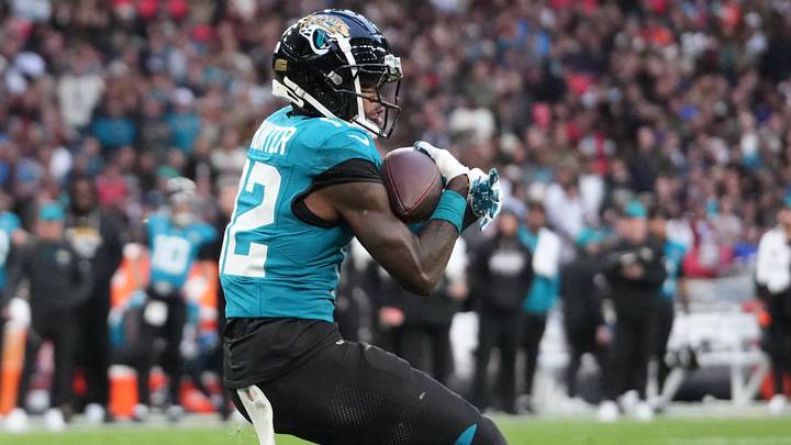 Oct 18, 2026; London, ENG; Jacksonville Jaguars wide receiver Travis Hunter (12) catches a pass and runs for a touchdown during the second half against the Houston Texans at Wembley Stadium. Mandatory Credit: Kirby Lee-Imagn Images Oct 18, 2026; London, ENG; Jacksonville Jaguars wide receiver Travis Hunter (12) catches a pass and runs for a touchdown during the second half against the Houston Texans at Wembley Stadium. Mandatory Credit: Kirby Lee-Imagn Images