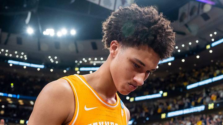 Tennessee forward Nate Ament (10) walks off the court as Michigan players celebrate their Final Four berth behind him after a NCAA Tournament Elite 8 game between Tennessee and Michigan at the United Center in Chicago on March 29, 2026. Tennessee forward Nate Ament (10) walks off the court as Michigan players celebrate their Final Four berth behind him after a NCAA Tournament Elite 8 game between Tennessee and Michigan at the United Center in Chicago on March 29, 2026.