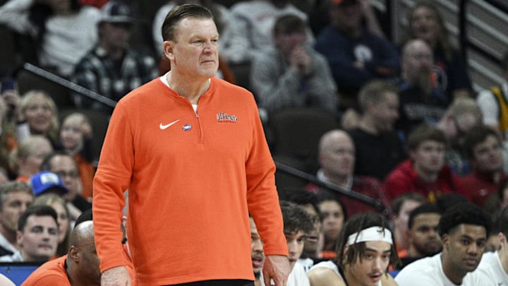 Mar 23, 2024; Omaha, NE, USA; Illinois Fighting Illini head coach Brad Underwood looks on during the second half against Duquesne Dukes in the second round of the 2024 NCAA Tournament at CHI Health Center Omaha. Mandatory Credit: Steven Branscombe-Imagn Images