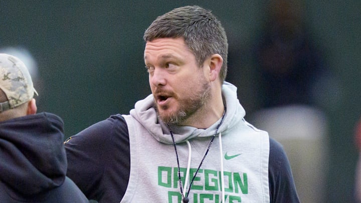 Oregon head coach Dan Lanning walks the field as the Oregon Ducks practice on Jan. 5, 2025, at the Moshofsky Center in Eugene, Oregon, ahead of the Peach Bowl.