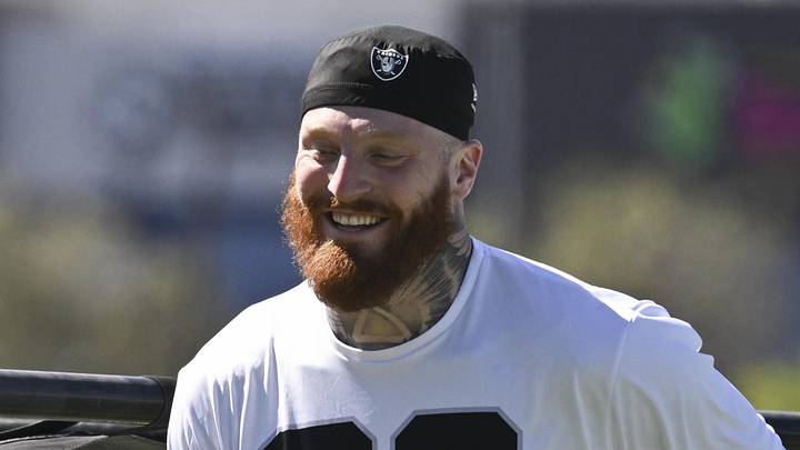 Las Vegas Raiders defensive end Maxx Crosby warms up during organized team activities.