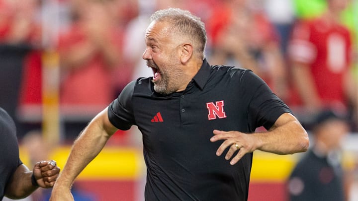 Nebraska football head coach Matt Rhule runs onto the field before the opening kickoff in Kansas City with strength & conditioning coach Corey Campbell. Nebraska football head coach Matt Rhule runs onto the field before the opening kickoff in Kansas City with strength & conditioning coach Corey Campbell.