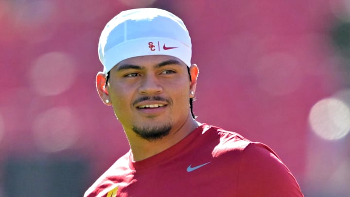 Oct 11, 2025; Los Angeles, California, USA;  USC Trojans quarterback Jayden Maiava (14) warms up prior to the game against the Michigan Wolverines at United Airlines Field at the Los Angeles Memorial Coliseum. Mandatory Credit: Jayne Kamin-Oncea-Imagn Images