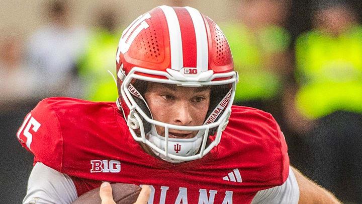 Indiana's Fernando Mendoza (15) runs during the Indiana versus Michigan State football game at Memorial Stadium on Saturday, Oct. 18, 2025.