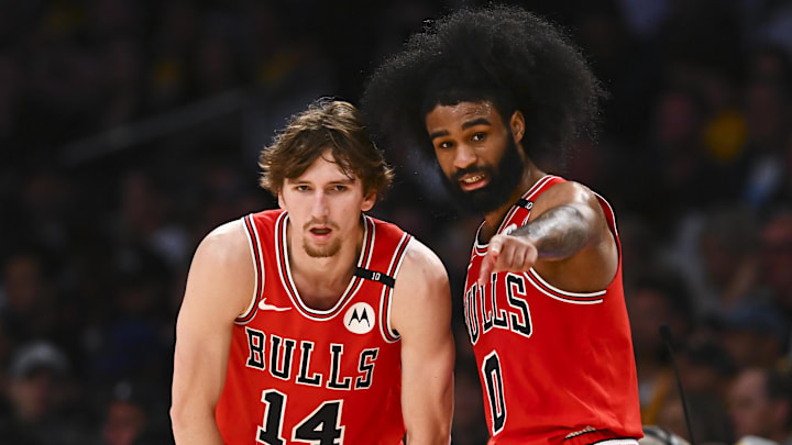 Mar 22, 2025; Los Angeles, California, USA; Chicago Bulls guard Coby White (0) points with Chicago Bulls forward Matas Buzelis (14) against the Los Angeles Lakers during the second half at Crypto.com Arena. Mandatory Credit: Jonathan Hui-Imagn Images