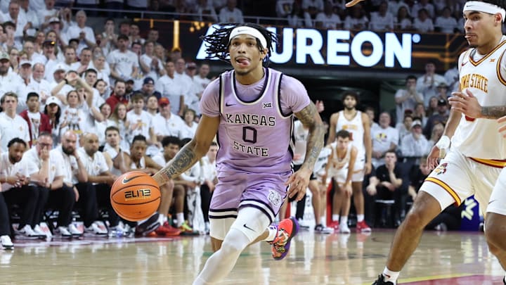Feb 1, 2025; Ames, Iowa, USA; Iowa State Cyclones guard Tamin Lipsey (3) watches Kansas State Wildcats guard Dug McDaniel (0) drive to the basket during the second half at James H. Hilton Coliseum. Mandatory Credit: Reese Strickland-Imagn Images