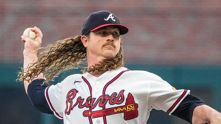 Aug 4, 2026; Cumberland, Georgia, USA; Atlanta Braves pitcher Grant Holmes (66) pitches against the Miami Marlins during the first inning at Truist Park. Mandatory Credit: Dale Zanine-Imagn Images