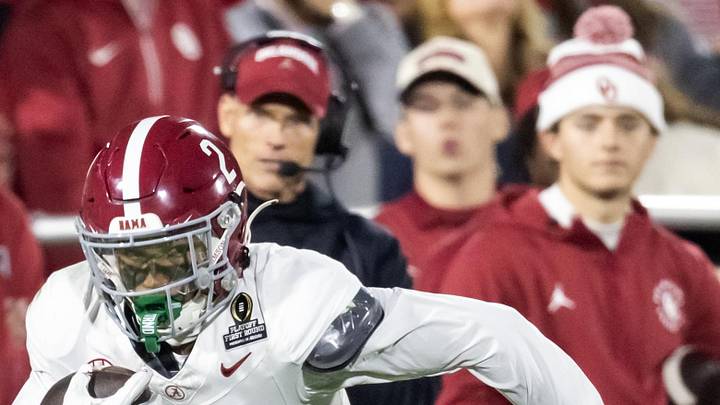 Dec 19, 2025; Norman, OK, USA; Alabama Crimson Tide defensive back Zabien Brown (2) returns an interception for a touchdown against the Oklahoma Sooners during the CFP National Playoff First Round at Gaylord Family Oklahoma Memorial Stadium. Mandatory Credit: Mark J. Rebilas-Imagn Images
