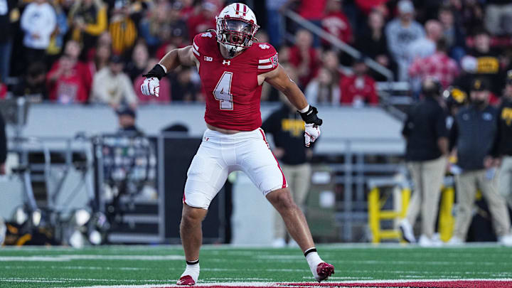Oct 11, 2025; Madison, Wisconsin, USA; Wisconsin Badgers linebacker Tackett Curtis (4) celebrates a defensive stop against the Iowa Hawkeyes in the first quarter at Camp Randall Stadium. Mandatory Credit: Ross Harried-Imagn Images