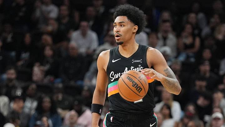 Feb 21, 2026; Austin, Texas, USA; San Antonio Spurs guard Dylan Harper (2) brings the ball up the court in the first half against the Sacramento Kings at Moody Center.