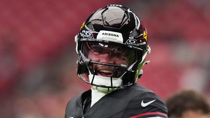 Arizona Cardinals quarterback Kyler Murray (1) chats with teammate Michael Wilson (14) before their game against the Tennessee Titans at State Farm Stadium in Glendale on Oct. 5, 2025.