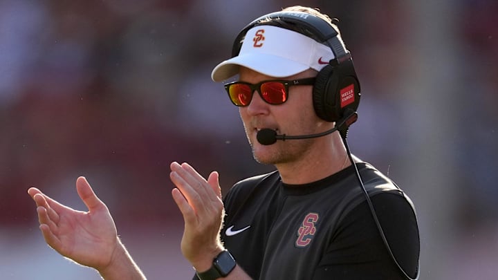 Aug 30, 2025; Los Angeles, California, USA; Southern California Trojans head coach Lincoln Riley watches from the sidelines against the Missouri State Bears in the first half at United Airlines Field at Los Angeles Memorial Coliseum. Mandatory Credit: Kirby Lee-Imagn Images Aug 30, 2025; Los Angeles, California, USA; Southern California Trojans head coach Lincoln Riley watches from the sidelines against the Missouri State Bears in the first half at United Airlines Field at Los Angeles Memorial Coliseum. Mandatory Credit: Kirby Lee-Imagn Images