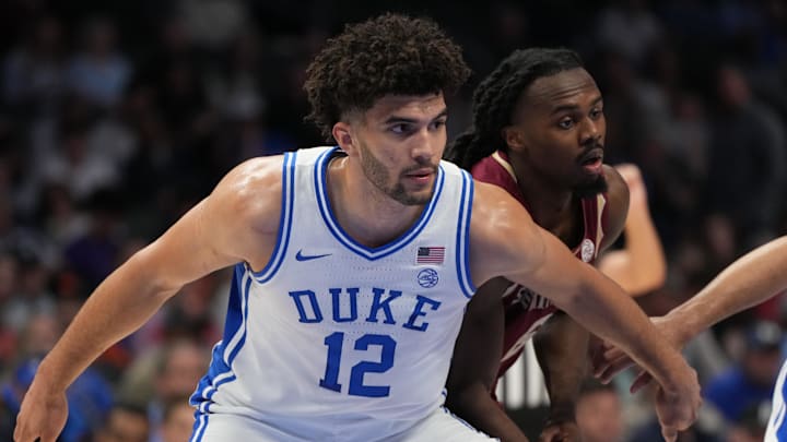 Mar 12, 2026; Charlotte, NC, USA; Duke Blue Devils forward Cameron Boozer (12) under the basket in the first half at Spectrum Center. Mandatory Credit: Bob Donnan-Imagn Images