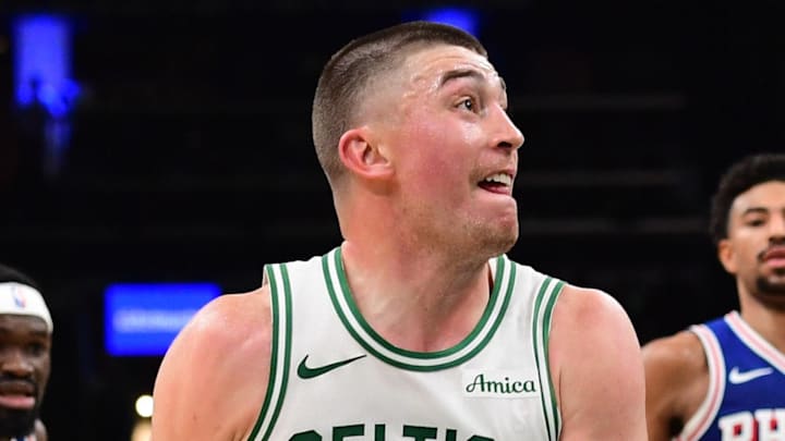 Apr 19, 2026; Boston, Massachusetts, USA; Boston Celtics guard Payton Pritchard (11) drives to the basket while Philadelphia 76ers guard Kelly Oubre Jr. (9) defends in the second half during game one of the first round of the 2026 NBA Playoffs at TD Garden. Mandatory Credit: Bob DeChiara-Imagn Images
