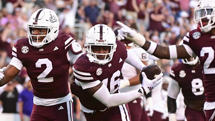 Mississippi State Bulldogs linebacker Zakari Tillman (16) reacts with teammates after an interception against the Texas A&M Aggies during the fourth quarter at Davis Wade Stadium at Scott Field. Mississippi State Bulldogs linebacker Zakari Tillman (16) reacts with teammates after an interception against the Texas A&M Aggies during the fourth quarter at Davis Wade Stadium at Scott Field.