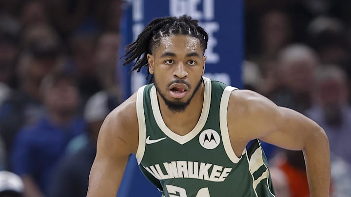 Milwaukee Bucks guard Cam Thomas (24) dribbles down the court against the Oklahoma City Thunder during the first half at Paycom Center on February 12, 2026.