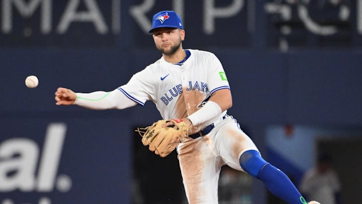 May 14, 2025; Toronto, Ontario, CAN;  Toronto Blue Jays shortstop Bo Bichette (11) throws out Tampa Bay Rays left fielder Chandler Simpson (not shown) in the fifth inning at Rogers Centre. 