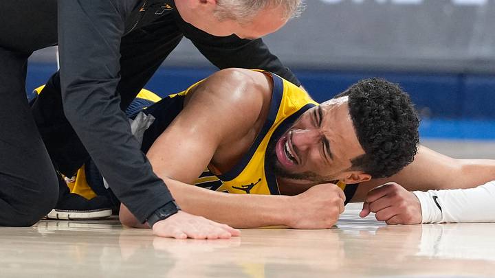Jun 22, 2025; Oklahoma City, Oklahoma, USA; Indiana Pacers guard Tyrese Haliburton (0) reacts after suffering an injury during the first quarter against the Oklahoma City Thunder during game seven of the 2025 NBA Finals at Paycom Center. Mandatory Credit: Kyle Terada-Imagn Images