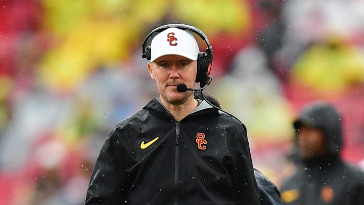 Nov 15, 2025; Los Angeles, California, USA; Southern California Trojans head coach Lincoln Riley watches game action against the Iowa Hawkeyes during the first half at the Los Angeles Memorial Coliseum. Mandatory Credit: Gary A. Vasquez-Imagn Images