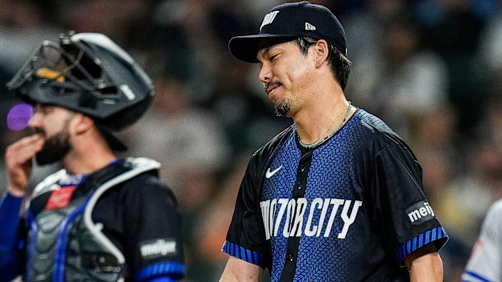 Former Detroit Tigers pitcher Kenta Maeda (18) reacts after Kansas City Royals shortstop Bobby Witt Jr. (7) scores a run during the ninth inning at Comerica Park in Detroit on Friday, April 18, 2025.