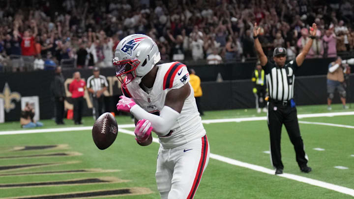 Oct 12, 2025; New Orleans, Louisiana, USA; New England Patriots wide receiver Kayshon Boutte (9) reacts after running for a touchdown during the second quarter against the New Orleans Saints at Caesars Superdome. Mandatory Credit: Matthew Hinton-Imagn Images