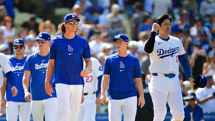 Jul 25, 2024; Los Angeles, California, USA; Blake Treinen (49) outfielder James Outman (33) pitcher Gavin Stone (35) pitcher River Ryan (70) pitcher Tyler Glasnow (31) catcher Will Smith (16) and designated hitter Shohei Ohtani (17) celebrate the victory against the San Francisco Giants at Dodger Stadium. Mandatory Credit: Gary A. Vasquez-Imagn Images Jul 25, 2024; Los Angeles, California, USA; Blake Treinen (49) outfielder James Outman (33) pitcher Gavin Stone (35) pitcher River Ryan (70) pitcher Tyler Glasnow (31) catcher Will Smith (16) and designated hitter Shohei Ohtani (17) celebrate the victory against the San Francisco Giants at Dodger Stadium. Mandatory Credit: Gary A. Vasquez-Imagn Images