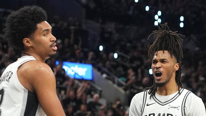 Apr 28, 2026; San Antonio, Texas, USA; San Antonio Spurs guard Stephon Castle (5) reacts after guard Dylan Harper (2) scored during the first half of game five of the first round of the 2026 NBA Playoffs against the Portland Trail Blazers at Frost Bank Center. Mandatory Credit: Scott Wachter-Imagn Images