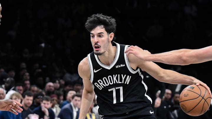 Mar 29, 2026; Brooklyn, New York, USA; Brooklyn Nets guard Ben Saraf (77) tries to get past Sacramento Kings guard/forward Daeqwon Plowden (29) and forward Doug McDermott (7) during the first half at Barclays Center. Mandatory Credit: John Jones-Imagn Images Mar 29, 2026; Brooklyn, New York, USA; Brooklyn Nets guard Ben Saraf (77) tries to get past Sacramento Kings guard/forward Daeqwon Plowden (29) and forward Doug McDermott (7) during the first half at Barclays Center. Mandatory Credit: John Jones-Imagn Images