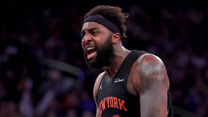 Dec 19, 2025; New York, New York, USA; New York Knicks center Mitchell Robinson (23) reacts after a dunk against the Philadelphia 76ers during the second quarter at Madison Square Garden. Mandatory Credit: Brad Penner-Imagn Images