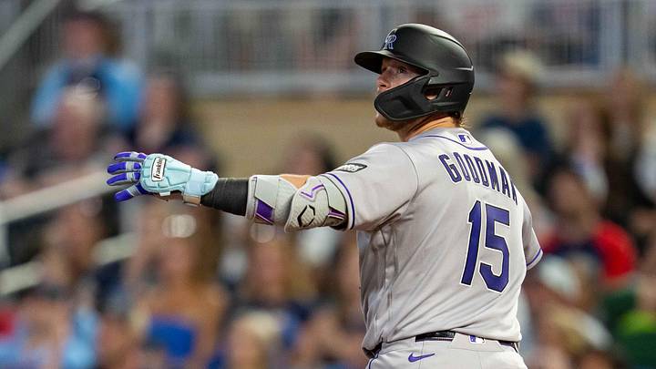 Colorado Rockies catcher Hunter Goodman (15) looks on as he hits a two-run home run against the Minnesota Twins.