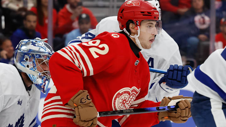 Oct 11, 2025; Detroit, Michigan, USA;  Detroit Red Wings center Marco Kasper (92) tries to screen Toronto Maple Leafs goaltender Anthony Stolarz (41) in the second period at Little Caesars Arena. Mandatory Credit: Rick Osentoski-Imagn Images Oct 11, 2025; Detroit, Michigan, USA;  Detroit Red Wings center Marco Kasper (92) tries to screen Toronto Maple Leafs goaltender Anthony Stolarz (41) in the second period at Little Caesars Arena. Mandatory Credit: Rick Osentoski-Imagn Images