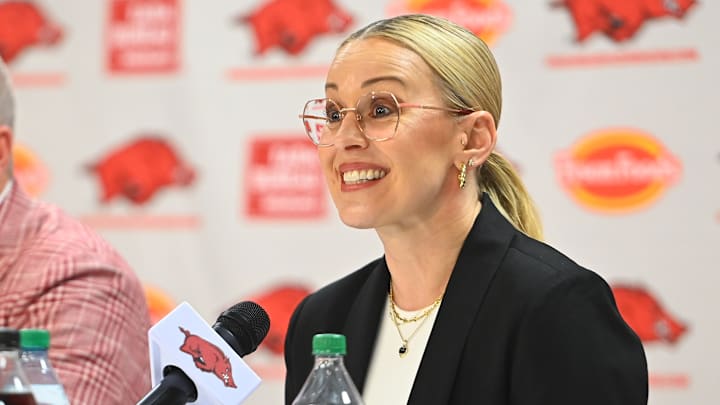 Athletic Director Hunter Yurachek with women's basketball coach Kelsi Musick at the introductory press conference Athletic Director Hunter Yurachek with women's basketball coach Kelsi Musick at the introductory press conference