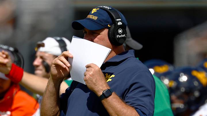Oct 18, 2025; Orlando, Florida, USA;  West Virginia Mountaineers head coach Rich Rodriguez during the first half against the Central Florida Knights at Acrisure Bounce House. Mandatory Credit: Russell Lansford-Imagn Images