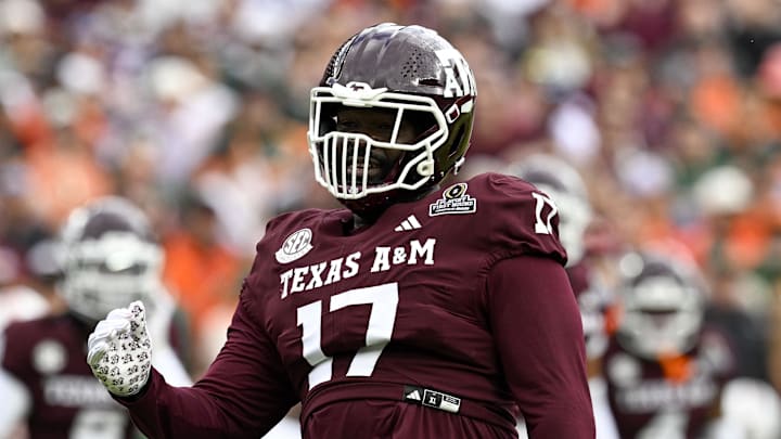 Dec 20, 2025; College Station, TX, USA; Texas A&M Aggies defensive tackle Albert Regis (17) celebrates during the game between the Aggies and the Hurricanes at Kyle Field. Mandatory Credit: Jerome Miron-Imagn Images