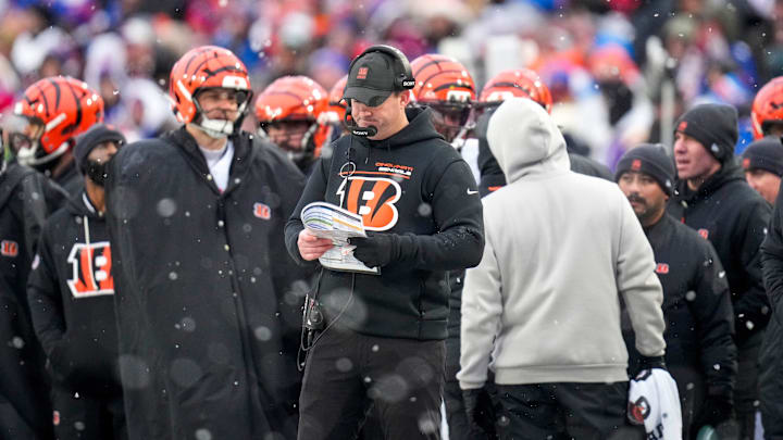Cincinnati Bengals head coach Zac Taylor looks to his play sheets in the fourth quarter of the NFL Week 14 game between the Buffalo Bills and the Cincinnati Bengals at Highmark Stadium in Orchard Park, N.Y., on Sunday, Dec. 7, 2025. The Bills overcame a halftime deficit to win 39-34. Cincinnati Bengals head coach Zac Taylor looks to his play sheets in the fourth quarter of the NFL Week 14 game between the Buffalo Bills and the Cincinnati Bengals at Highmark Stadium in Orchard Park, N.Y., on Sunday, Dec. 7, 2025. The Bills overcame a halftime deficit to win 39-34.