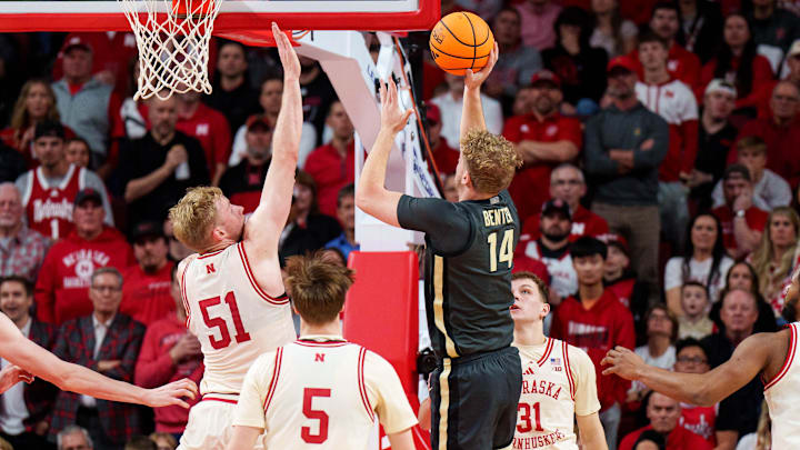 Purdue Boilermakers guard Jack Benter shoots the ball against Nebraska Cornhuskers forward Rienk Mast and guard Cale Jacobsen during the first half at Pinnacle Bank Arena.