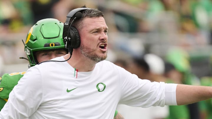 Sep 6, 2025; Eugene, Oregon, USA; Oregon Ducks head coach Dan Lanning instructs players during the first half against the Oklahoma State Cowboys at Autzen Stadium. Mandatory Credit: Troy Wayrynen-Imagn Images