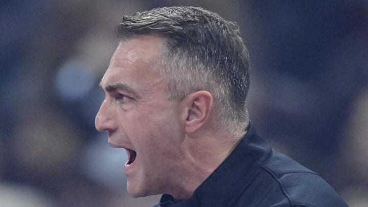 Toronto Raptors head coach Darko Rajakovic reacts in the first quarter against the Cleveland Cavaliers.