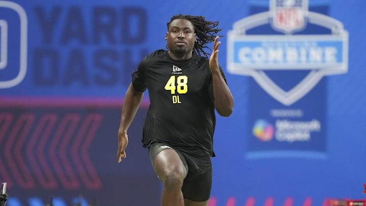 Feb 26, 2026; Indianapolis, IN, USA; UCF defensive lineman Malachi Lawrence (DL48) runs the 40-yard dash during the NFL Scouting Combine  at Lucas Oil Stadium. Mandatory Credit: Kirby Lee-Imagn Images
