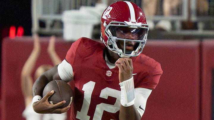 Alabama quarterback Keelon Russell (12) scrambles out of the pocket during the game with South Carolina at Saban Field at Bryant Denny Stadium. Alabama quarterback Keelon Russell (12) scrambles out of the pocket during the game with South Carolina at Saban Field at Bryant Denny Stadium.