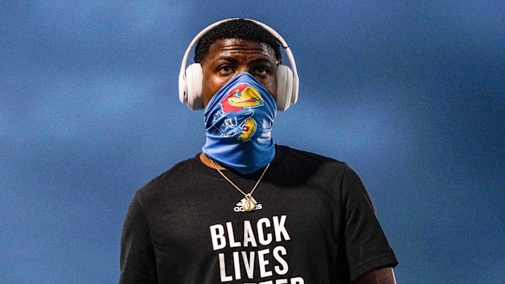 Sep 12, 2020; Lawrence, Kansas, USA; Kansas Jayhawks cornerback Karon Prunty (9) wears a Black Lives Matter shirt during warmups before a game against the Coastal Carolina Chanticleers at David Booth Kansas Memorial Stadium. Mandatory Credit: Jay Biggerstaff-Imagn Images