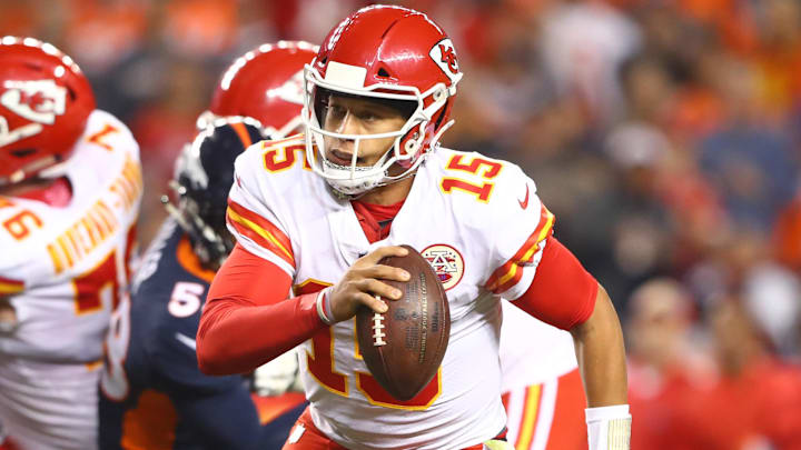 Oct 1, 2018; Denver, CO, USA; Kansas City Chiefs quarterback Patrick Mahomes (15) runs the ball for a touchdown against the Denver Broncos at Broncos Stadium at Mile High. Mandatory Credit: Mark J. Rebilas-Imagn Images Oct 1, 2018; Denver, CO, USA; Kansas City Chiefs quarterback Patrick Mahomes (15) runs the ball for a touchdown against the Denver Broncos at Broncos Stadium at Mile High. Mandatory Credit: Mark J. Rebilas-Imagn Images