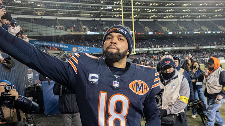 Dec 20, 2025; Chicago, Illinois, USA; Chicago Bears quarterback Caleb Williams (18) high fives fans after defeating the Green Bay Packers during overtime at Soldier Field. Mandatory Credit: Mark Hoffman-USA TODAY Network via Imagn Images