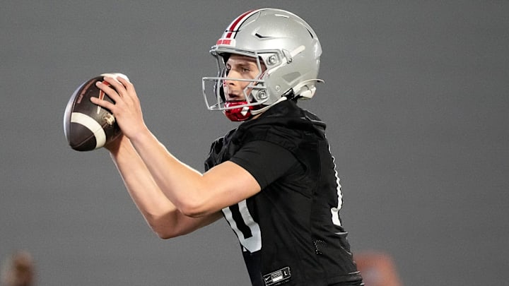 Ohio State Buckeyes quarterback Julian Sayin (10) takes a snap during spring football practice at the Woody Hayes Athletic Center on March 17, 2025.