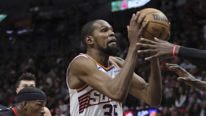Jan 29, 2024; Miami, Florida, USA; Phoenix Suns forward Kevin Durant (35) moves to the basket against Miami Heat center Bam Adebayo (13) during the second quarter at Kaseya Center. Mandatory Credit: Sam Navarro-Imagn Images Jan 29, 2024; Miami, Florida, USA; Phoenix Suns forward Kevin Durant (35) moves to the basket against Miami Heat center Bam Adebayo (13) during the second quarter at Kaseya Center. Mandatory Credit: Sam Navarro-Imagn Images